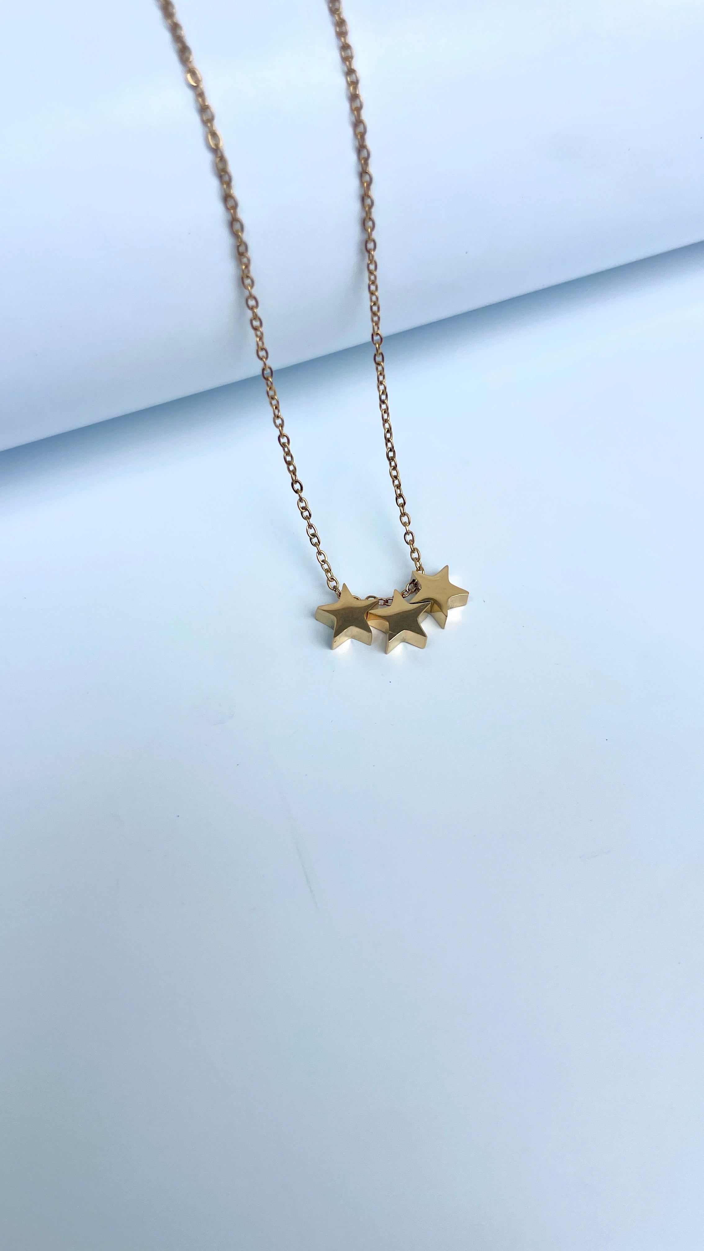 Triple star pendant